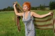 woman with scarf in a field