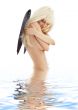 bathing angel with black wings