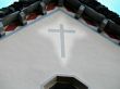 illuminated cross on church