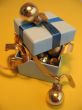 Blue gift box with golden balls