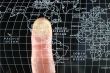 Finger on world Map