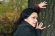 young woman with black hair in glasses, autumn shot