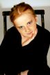 young girl sitting on a chair