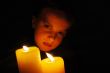 young girl in candlelight
