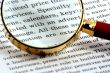 Open page and  magnifying lens