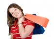 beautiful teenager with shopping bags