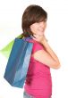 beautiful teenager with shopping bags