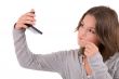 Checking her makeup