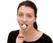 woman eats yoghurt