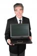 senior businessman with laptop