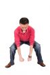 casual guy lifting something