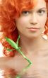 lovely redhead with bamboo in water