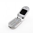Clamshell cell phone on white background