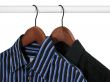 Black and blue shirts on a rack