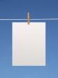 Blank paper sheet on a clothes line (+2 clipping paths)