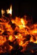 Glowing coals in the fireplace