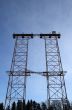 Big double electricity pylon in the forest