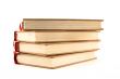 Four hardcover books on white background