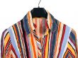Colorful striped shirt on white background