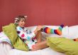 Pulling on my funny socks