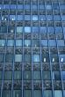 Office building: windows with lights