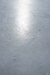 Sun reflection on the surface of an ice rink