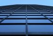 Glass-windowed skyscraper reaching the sky