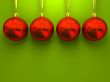 Red christmas balls on green background 3D rendering