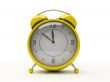Yellow alarm clock isolated on white background 3D