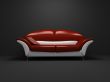 Red sofa on dark background