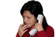 Businesswoman working, holding a cellphone