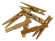 Wooden clothespins on white background