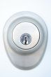 Metallic door lock with keyhole