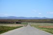 Country road leading to mountains