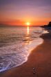 Deserted beach at sunset