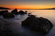 Rocky beach at dusk