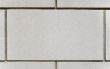 White brick block with space for text