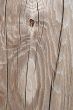Cracked and knotty wood texture