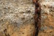 Rusty chain on a stone
