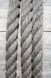 Boat rope on wooden background