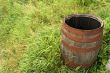 Wooden barrel in grass