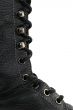 Closeup of black leather boot