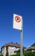 No parking sign in front of a new house