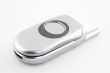 Closed silver clamshell cell phone