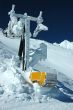 Ski lift must after snow fall in mountains.