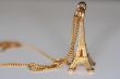 small gold souvenir of eiffel tower