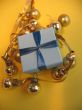 Blue gift box with golden balls