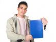 casual student displaying notebook