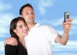 couple taking a pic with cell phone