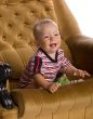 baby in big armchair